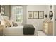 Bedroom with golf-themed decor and light wood furniture at 11729 71St E Ave, Palmetto, FL 34221