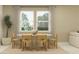 Dining room with round table and six woven chairs at 11729 71St E Ave, Palmetto, FL 34221