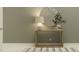 Entryway with console table, mirror, and a lamp at 11729 71St E Ave, Palmetto, FL 34221