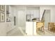Bright kitchen with island, stainless steel appliances, and white cabinetry at 11729 71St E Ave, Palmetto, FL 34221