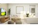 Living area with sectional sofa and a large TV at 11729 71St E Ave, Palmetto, FL 34221