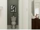 Modern bathroom with toilet and dark gray walls at 11555 E 71St Ter, Palmetto, FL 34221