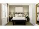 Bedroom with wood bed frame and green accent wall at 11555 E 71St Ter, Palmetto, FL 34221