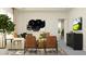 Living room with sectional sofa and large artwork at 11555 E 71St Ter, Palmetto, FL 34221
