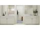 Modern bathroom with double sinks and a walk-in shower at 11562 E 71St Ter, Palmetto, FL 34221