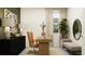 Spacious home office with a desk, seating, and large window for natural light at 11562 E 71St Ter, Palmetto, FL 34221