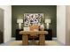 Bright home office features a large desk, comfortable chair, and stylish decor at 11562 E 71St Ter, Palmetto, FL 34221
