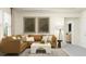 Bright living room featuring a cozy sectional sofa and stylish coffee table at 11562 E 71St Ter, Palmetto, FL 34221