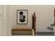 Stylish staircase with a modern wooden handrail and neutral wall decor at 11562 E 71St Ter, Palmetto, FL 34221
