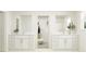 Double vanity bathroom with walk-in closet access at 11915 Blue Diamond Trl, Parrish, FL 34219