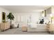 Main bedroom with king bed, comfy chair, and en-suite bath at 11915 Blue Diamond Trl, Parrish, FL 34219