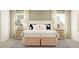 Main bedroom with king-size bed and stylish decor at 11915 Blue Diamond Trl, Parrish, FL 34219