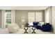 Spacious living room with navy sectional sofa and stylish decor at 11915 Blue Diamond Trl, Parrish, FL 34219