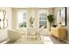 Elegant office with two armchairs, a desk, and gold accents at 11915 Blue Diamond Trl, Parrish, FL 34219