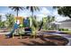 Modern playground with slides and play structures in a landscaped setting at 11915 Blue Diamond Trl, Parrish, FL 34219