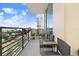 Spacious balcony with outdoor furniture and city views at 1208 E Kennedy Blvd # 729, Tampa, FL 33602