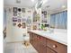 Bathroom with dark wood vanity and eclectic wall decor at 1208 E Kennedy Blvd # 729, Tampa, FL 33602