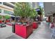 Outdoor patio with seating, fire pit, and nearby restaurants at 1208 E Kennedy Blvd # 729, Tampa, FL 33602