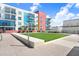 Ground level courtyard with grassy lawn and seating at 1208 E Kennedy Blvd # 729, Tampa, FL 33602