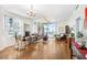 Bright living room with hardwood floors, city views, and comfortable seating at 1208 E Kennedy Blvd # 729, Tampa, FL 33602