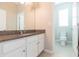 Bathroom with granite countertop and white cabinets at 12312 Bay Estuary Bnd, Riverview, FL 33579