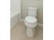 Bathroom with toilet and tan tile floor at 12312 Bay Estuary Bnd, Riverview, FL 33579