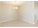 Bright dining room with chandelier and tile floors at 12312 Bay Estuary Bnd, Riverview, FL 33579