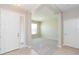 Bright and airy foyer with tile flooring and built-in shelving at 12312 Bay Estuary Bnd, Riverview, FL 33579