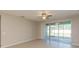 Bright Gathering room with sliding glass doors leading to a patio at 12312 Bay Estuary Bnd, Riverview, FL 33579