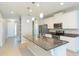 Modern kitchen with stainless steel appliances and granite countertops at 12312 Bay Estuary Bnd, Riverview, FL 33579