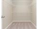 Large walk-in closet with wire shelving at 12312 Bay Estuary Bnd, Riverview, FL 33579