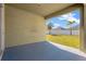 Covered patio with view of fenced backyard at 13122 Satin Lily Dr, Riverview, FL 33579