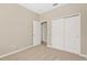 Spacious bedroom with carpet flooring and double door closet at 13122 Satin Lily Dr, Riverview, FL 33579