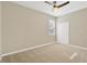 Bright bedroom featuring a ceiling fan and window at 13122 Satin Lily Dr, Riverview, FL 33579
