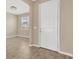 Open entryway with view into a bright office and tile flooring at 13122 Satin Lily Dr, Riverview, FL 33579