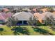 Aerial view showcasing the home's location in a quiet community at 15724 Aurora Lake Cir, Wimauma, FL 33598
