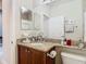 Clean bathroom with granite countertop and updated vanity at 15724 Aurora Lake Cir, Wimauma, FL 33598