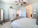 Charming bedroom with a queen-size bed and ample closet space at 15724 Aurora Lake Cir, Wimauma, FL 33598