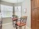Cozy breakfast nook with a small table and two chairs at 15724 Aurora Lake Cir, Wimauma, FL 33598