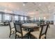 Game room with card tables and comfortable seating at 15724 Aurora Lake Cir, Wimauma, FL 33598