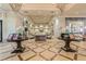 Elegant community clubhouse lobby with seating area at 15724 Aurora Lake Cir, Wimauma, FL 33598