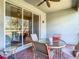 Enjoy relaxing on this brick patio, featuring a glass-top table and chairs at 15724 Aurora Lake Cir, Wimauma, FL 33598