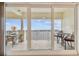 Private balcony with outdoor seating and breathtaking water views at 17717 Gulf Blvd # 601, Redington Shores, FL 33708