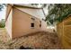 Landscaped backyard with a wooden privacy fence at 1833 Hillcrest St, Tarpon Springs, FL 34689