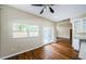 Bright dining area with hardwood floors and French doors to patio at 1833 Hillcrest St, Tarpon Springs, FL 34689