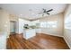 Open concept kitchen with island and ceiling fan at 1833 Hillcrest St, Tarpon Springs, FL 34689