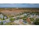 Wide aerial view of neighborhood including subject property at 1833 Hillcrest St, Tarpon Springs, FL 34689