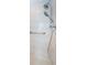 Walk-in shower with dual shower heads and grab bar at 1833 Hillcrest St, Tarpon Springs, FL 34689