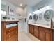 Double vanity bathroom with a large mirror and plenty of storage at 205 Silver Falls Dr, Apollo Beach, FL 33572