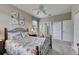 Guest bedroom with a ceiling fan and large closet at 205 Silver Falls Dr, Apollo Beach, FL 33572